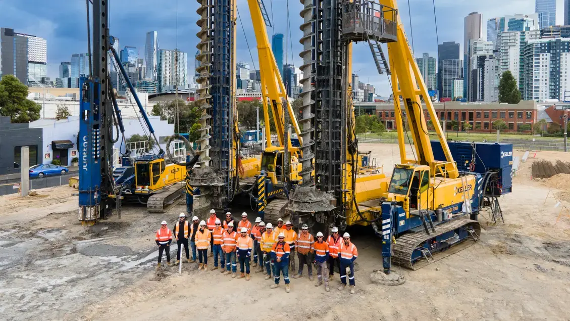 Keller site team standing in front of rigs