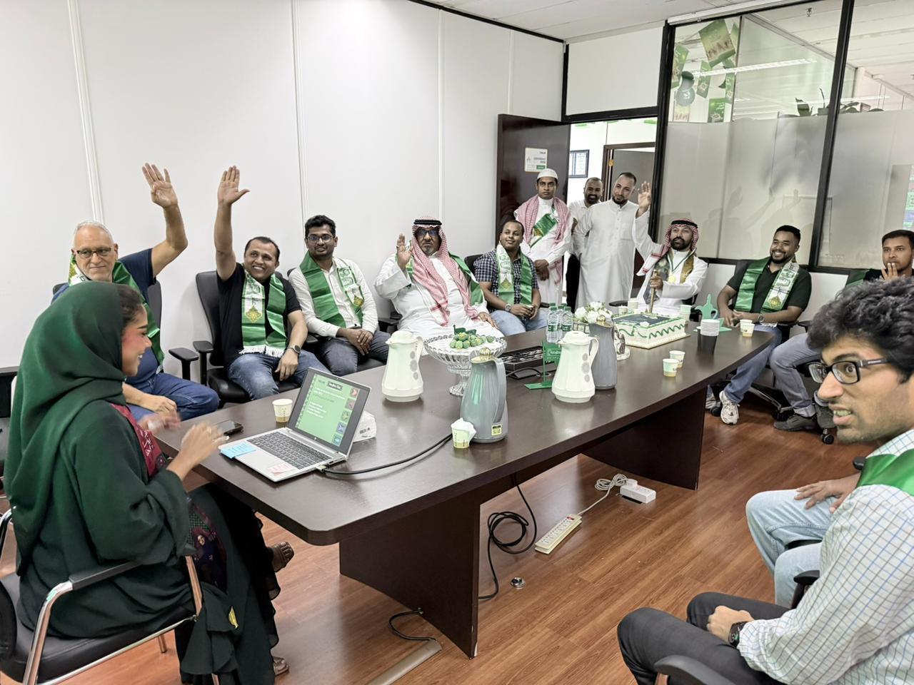 Employees gathered in the meeting room to share their thoughts and personal experiences, highlighting the rich culture and heritage of the Kingdom.